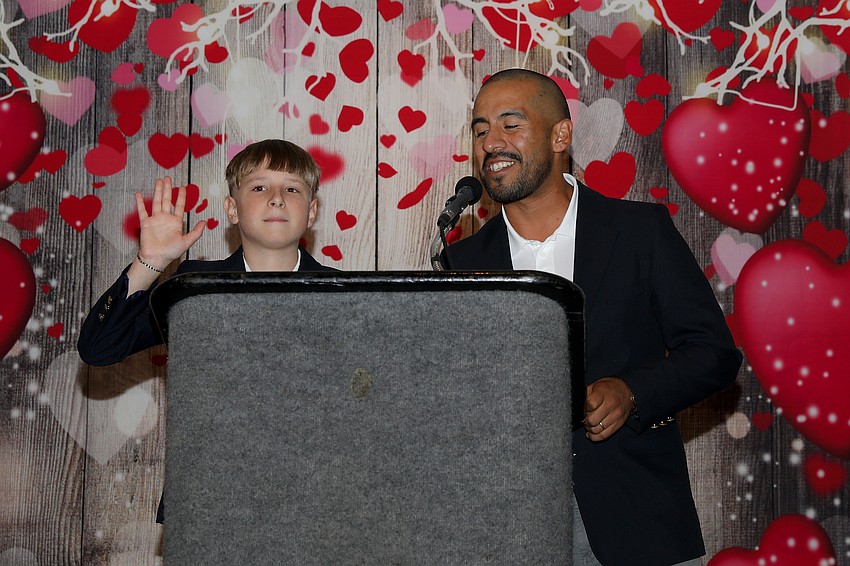 VMA fifth grade teacher Diego Velasco introduces an enthusiastic speaker, Wyatt Morton.