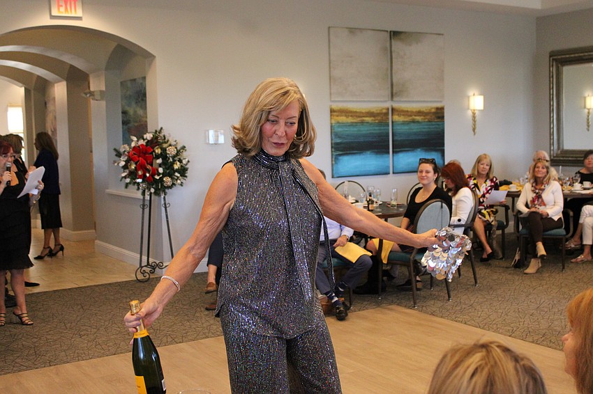 Julie Griffin gives the crowd a good look at her outfit.