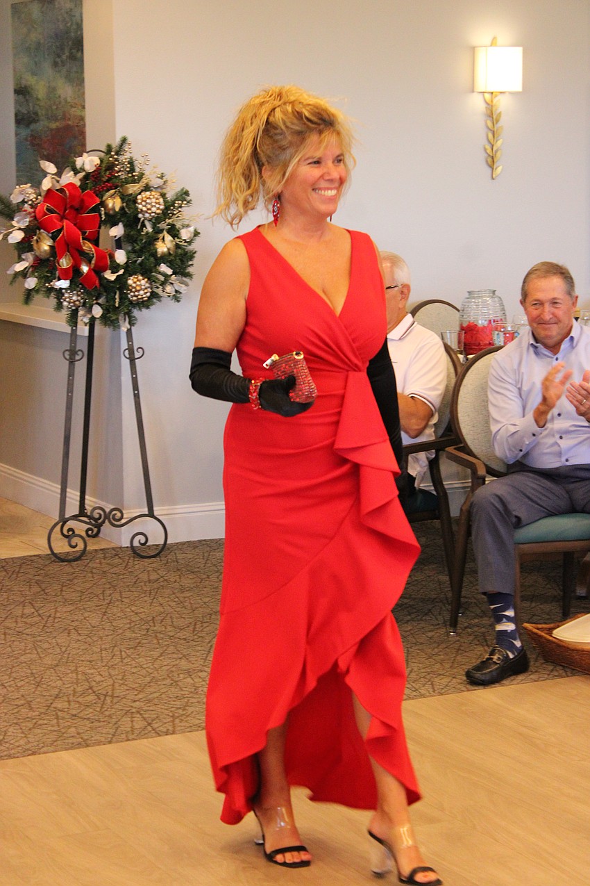 Jacquelyn Smith is, indeed, the lady in red during the Waterlefe Fashion Show.