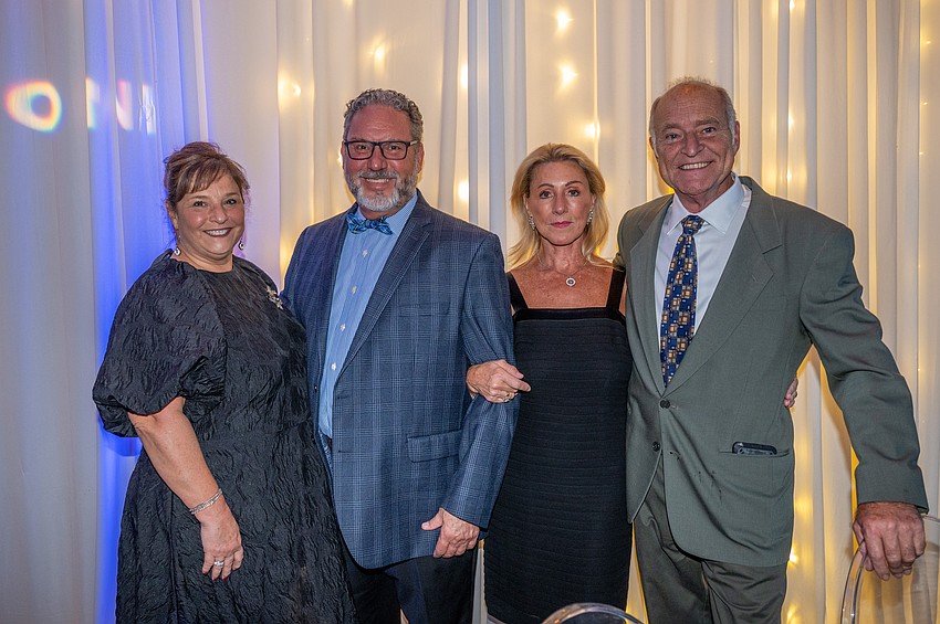 Laurel and Greg Couter, Salley Fernandez and Charles Reibold