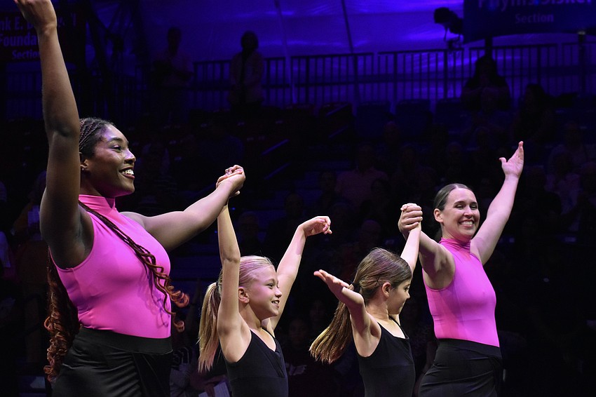 Sarasota Contemporary Dance returns to the stage for a final bow. Earlier in the event, the dancers performed 