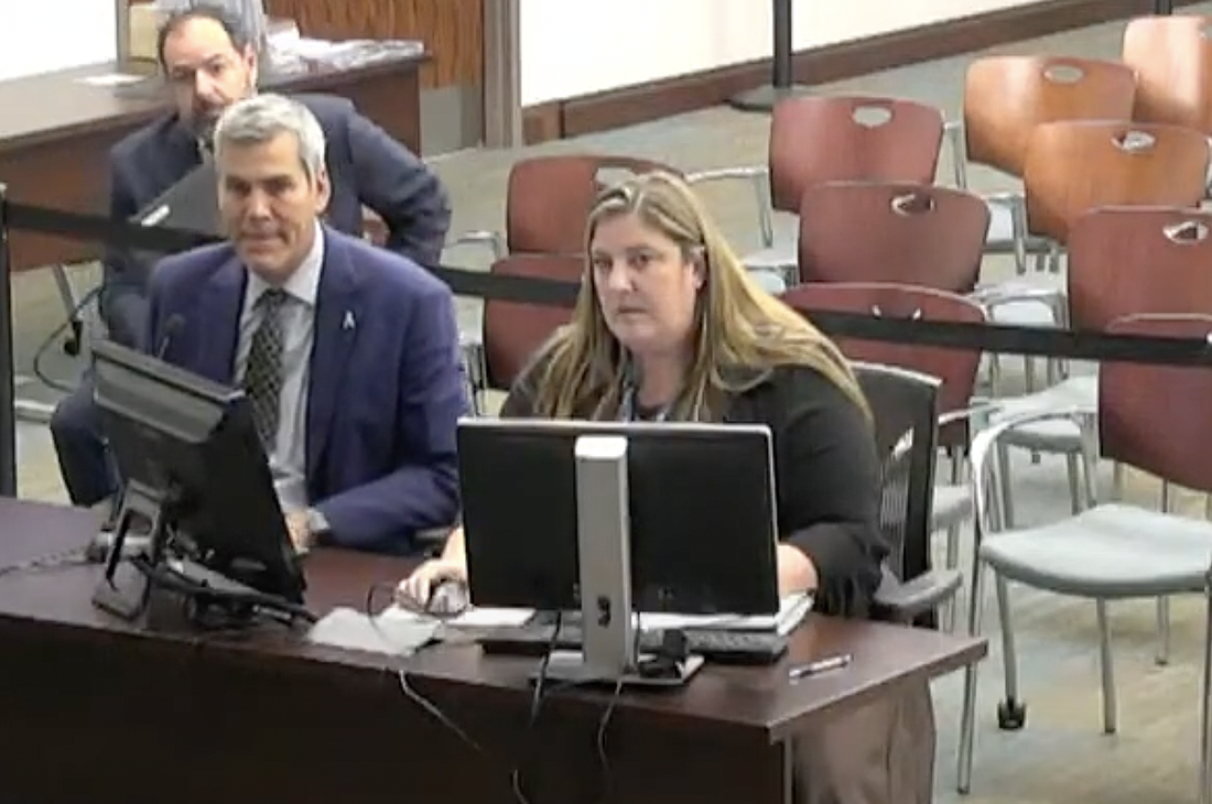 Former Palm Coast Utility Director Amanda Rees (right) was fired on Nov. 14 for "aggressive and inappropriate" behavior. Image screenshot from Palm Coast Council meeting