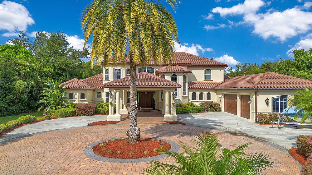 The home at 2508 Hempel Cove Court, Windermere, sold Nov. 14, for $1,770,000. This Mediterranean-inspired custom estate is sited behind a private gate leading on a 1.21-acre lot. The sellers were represented by Simon Simaan, The Simon Simaan Group.