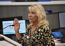 Myakka City's Carol Felts gets emotional as she's sworn in as the District 1 commissioner on Nov. 19.