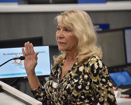 Myakka City's Carol Felts gets emotional as she's sworn in as the District 1 commissioner on Nov. 19.