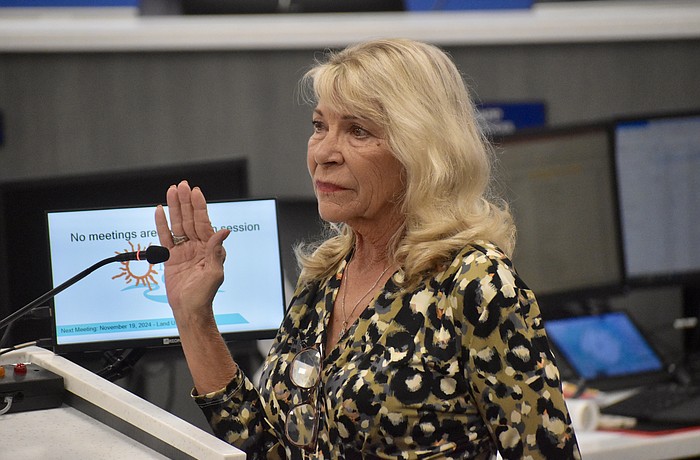 Myakka City's Carol Felts gets emotional as she's sworn in as the District 1 commissioner on Nov. 19.