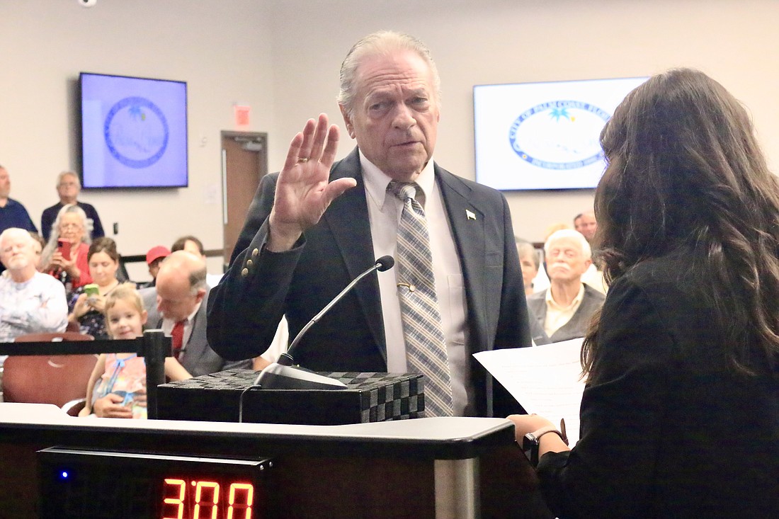 Ray Stevens takes his oath of office to represent the Palm Coast City Council District 3 seat. File photo by Sierra Williams