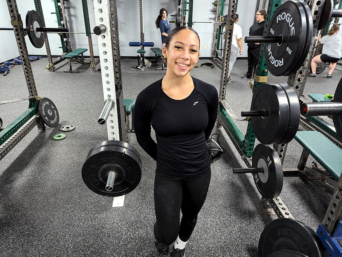 FPC weightlifter Nya Williams set four school records in the 119-pound weight class. Photo by Brent Woronoff