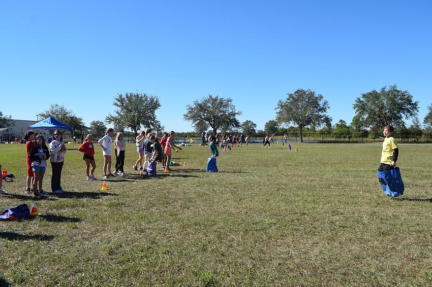Sack races bring out the competitive spirit in students.