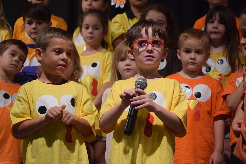 Kindergartners Jaxon Gilmore and Charlie Meserve share what their class is grateful for, which includes their pets and love.