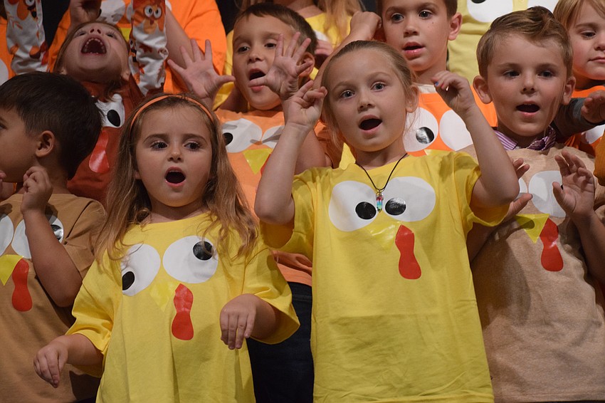 Kindergartners Callie Wilson and Addison Hollands gobble the night away.