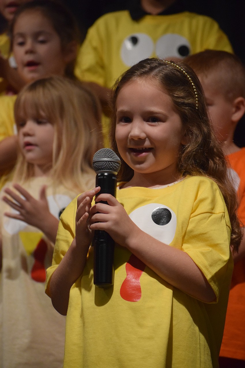 Kindergartner Bailey Dent shares part of the Thanksgiving poem she and five other kindergartners memorized.
