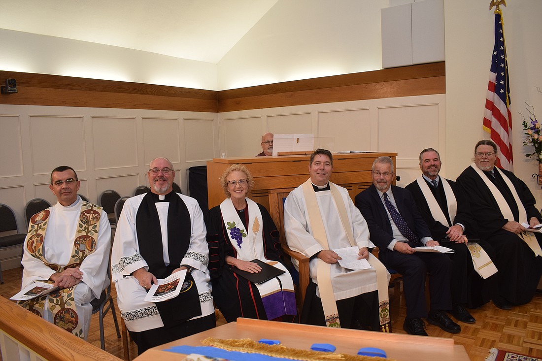 The Rev. Robert Dziedziak, Rev. Kenneth Blyth, Rev. Julia Piermont, Rev. David Marshall, Rabbi Stephen Sniderman, Rev. Brock Patterson and Rev. Jeffrey Nunes processed together in the church for the Interfaith service.