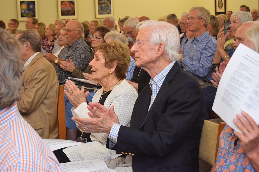 Jane and John Vorel from St. Mary of the Sea Catholic Church clapped for the six religious leaders of Longboat Key.