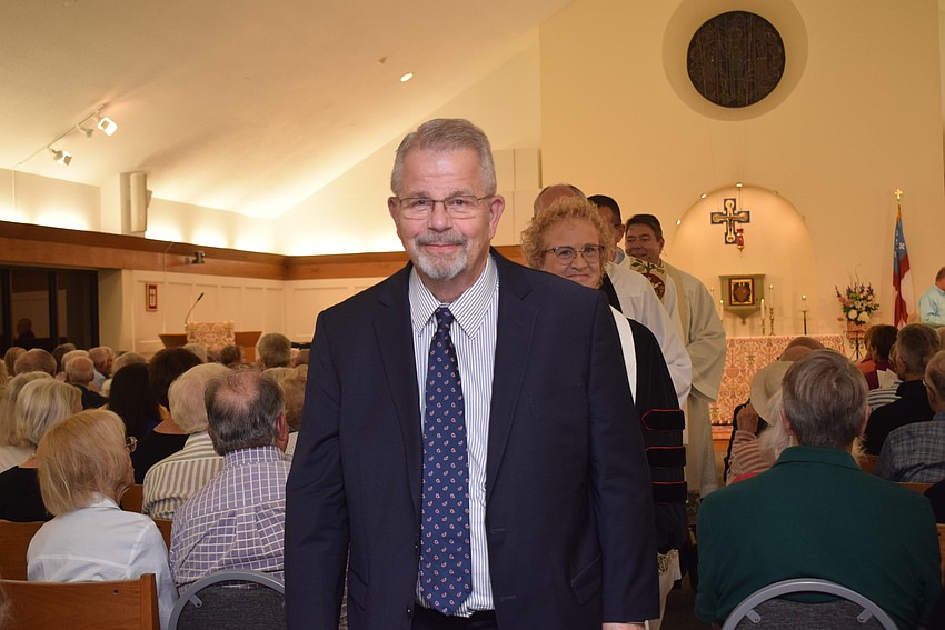 Rabbi Stephen Sniderman exited the service followed by his religious peers.