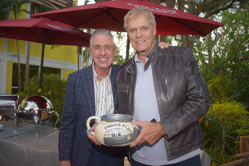 Michael Garey and Chris Sachs at the Kiwanis Club evening social.