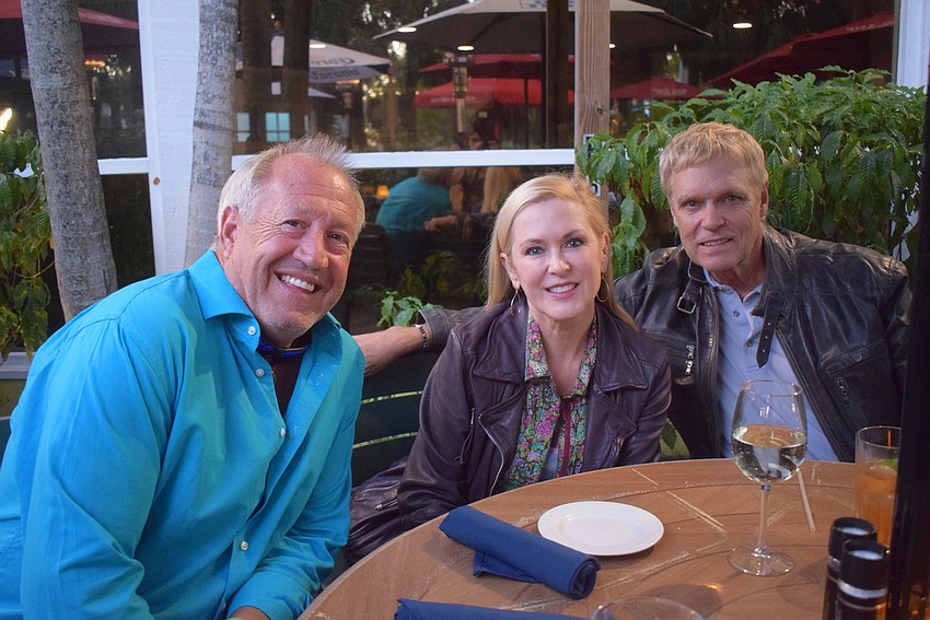 Kevin Malone, Tammy and Chris Sachs at the Kiwanis Club evening social.