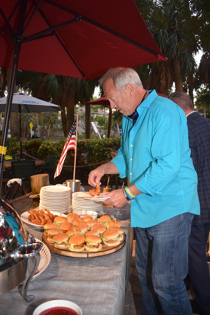 Kevin Melone enjoyed the food spread provided by the Lazy Lobster.