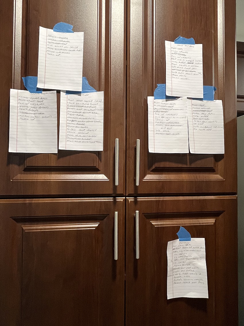 The to-do list gets shorter as Braden River High School JROTC cadets complete tasks in the home.