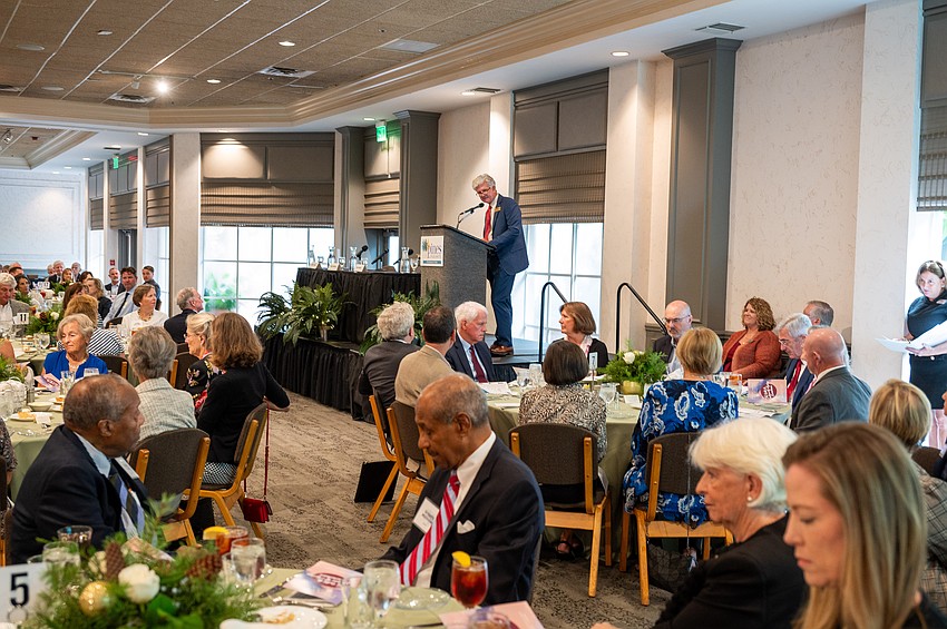 Mike Ward, president and CEO of  the Pines of Sarasota, gives  opening remarks at the luncheon.