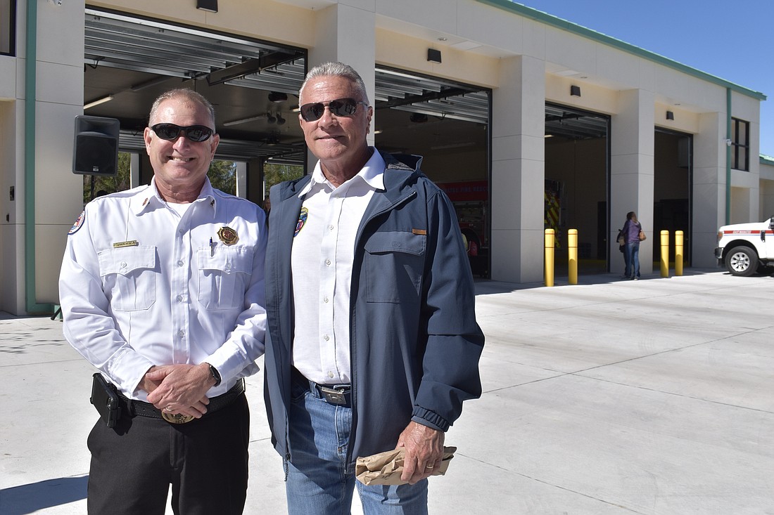 Cheif Lee Whitehurst and Fire Commissioner Garry Lawson celebrate another East County fire station opening.