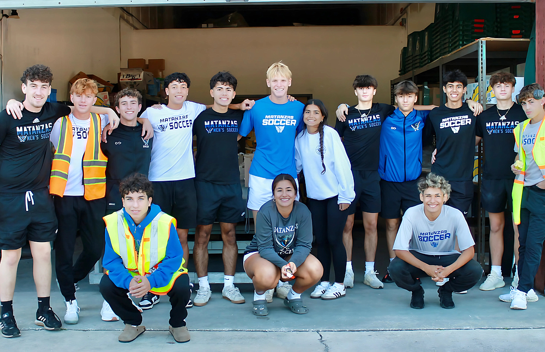 Matanzas High School varsity boys and girls soccer players volunteered at the Grace Community Food Pantry on Nov. 16. Courtesy photo