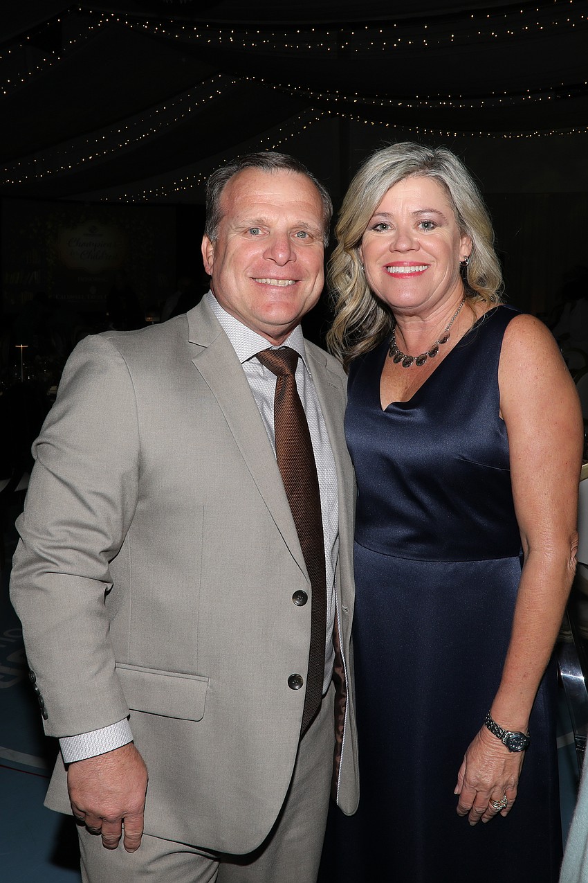 Sarasota High School graduates are BGCSDC President and CEO Bill Sadlo who takes a minute for a photo with his wife, Robyn.