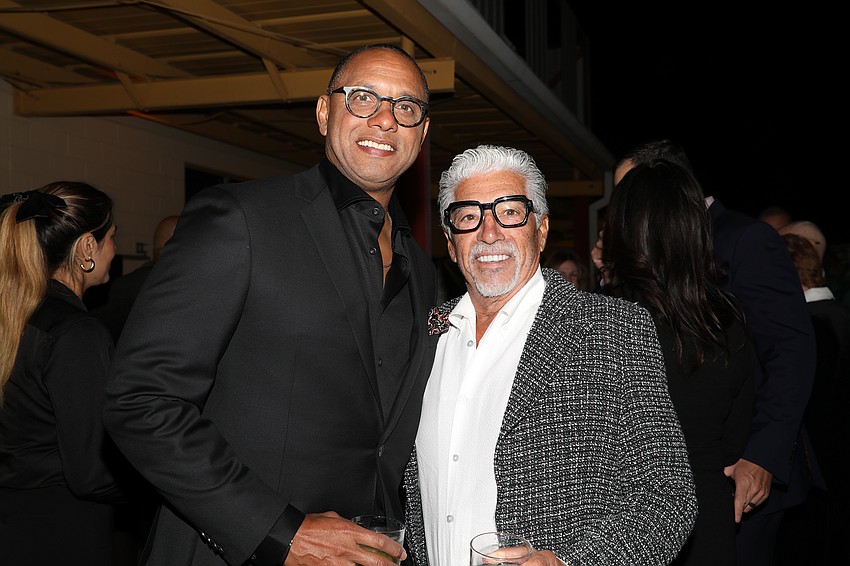 Duane Young found in conversation with the Wine, Women & Shoes 'soleman' Carl Troiano who may or may not be recruiting Mr. Young.