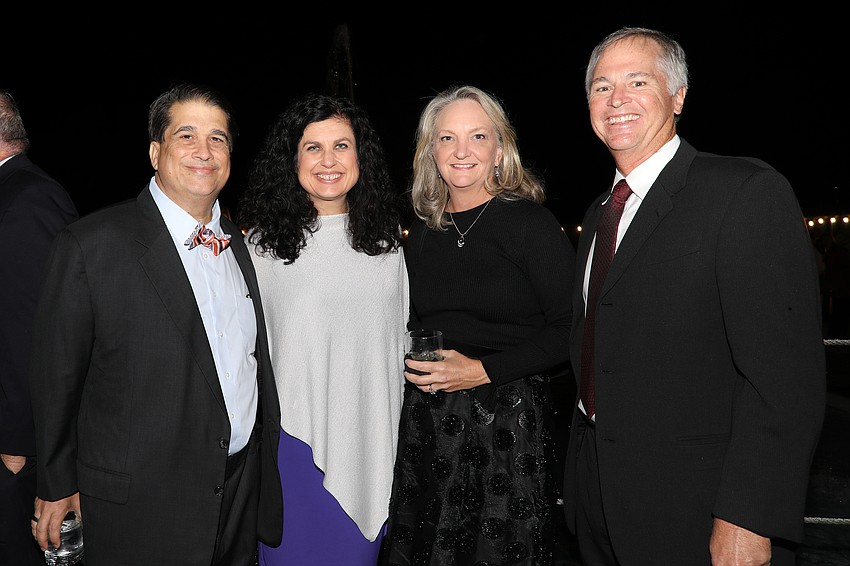 Eric and Christine Robinson with Susan and Phillip Mihm