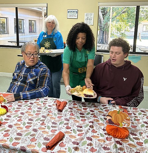 Thanksgiving lunch is served to Sunrise day program participants and residents. Courtesy photo