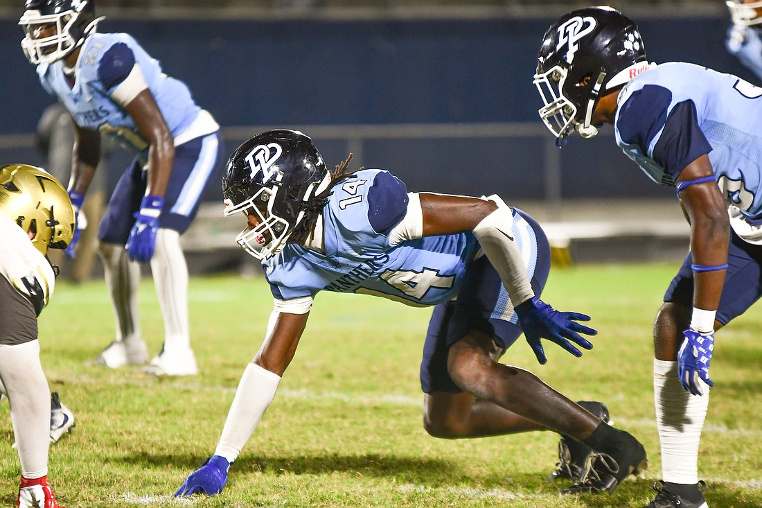 Dr. Phillips defensive end Maurice Jones Jr. (No. 14) lined up to rush the passer.