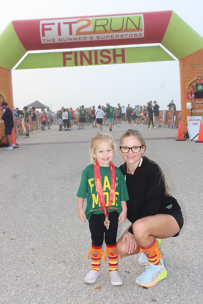Parrish 3-year-old Berkeley Eddy and Amy Neville warm up for the Florida Turkey Trot.