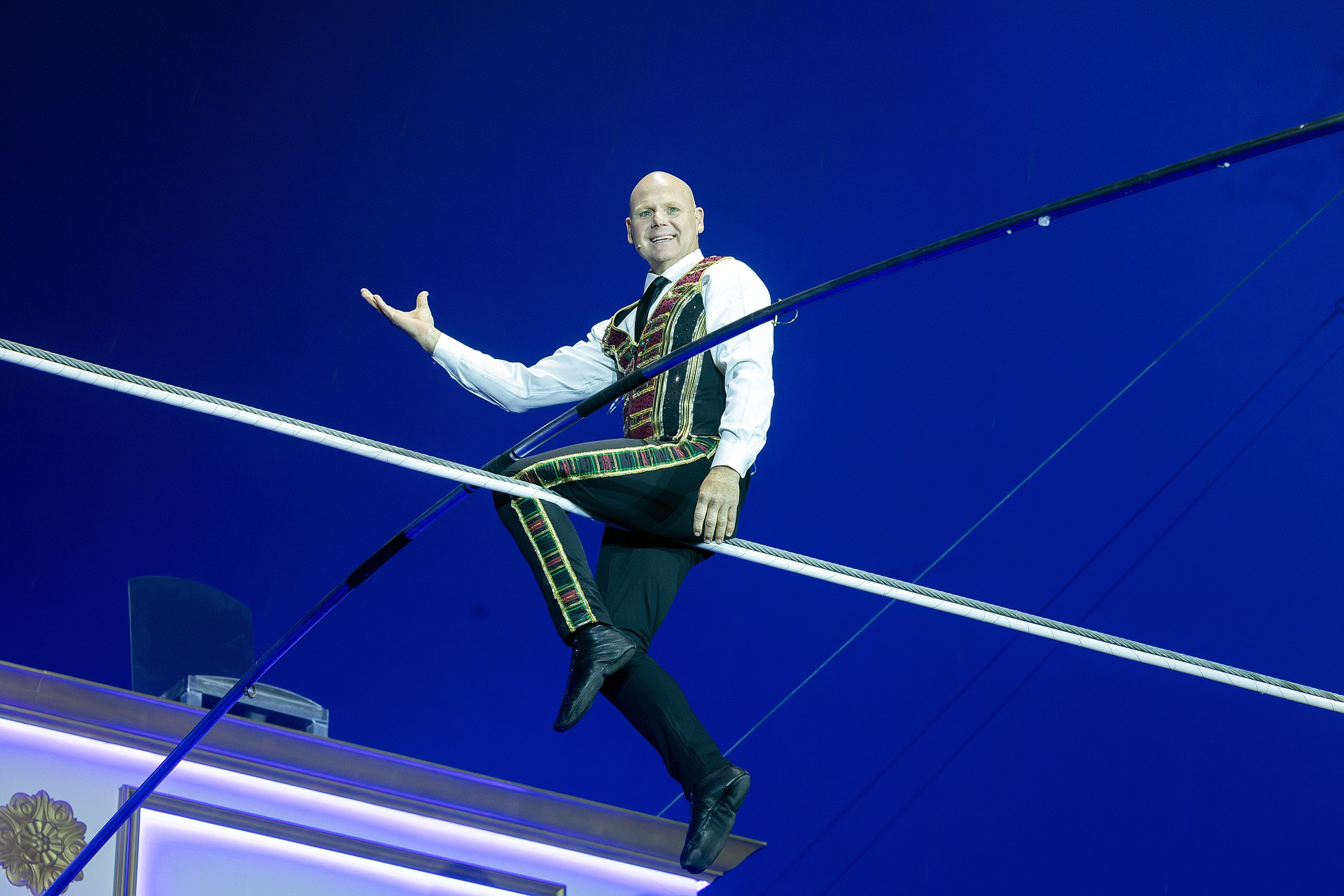 Superstar aerialist Nik Wallenda greets the crowd at Wonderland Circus: Illuminate, which runs through Jan. 5 at the Big Top near UTC Mall.