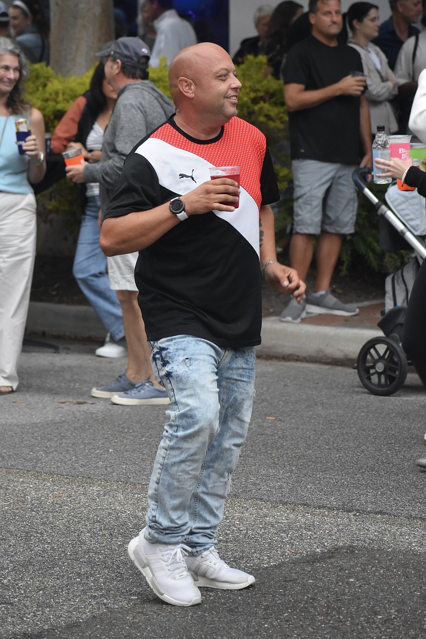 Carl Winters dances to the live music.