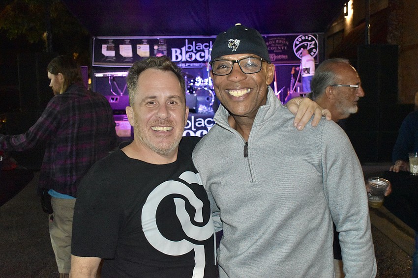 Mark Tuchman and former city manager Marlon Brown