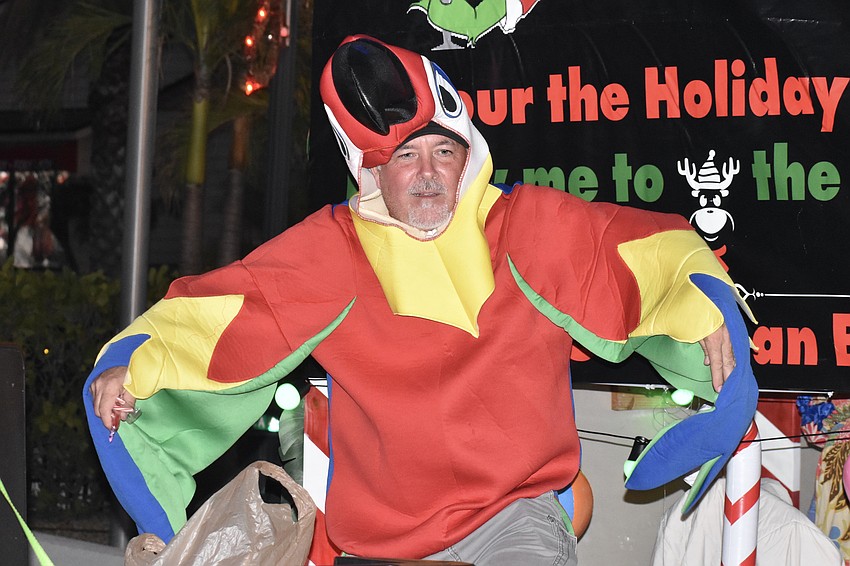 Tom Dodge of Siesta Key Wine Bar shows off colorful plumage.