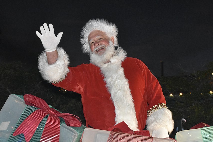 Santa Claus arrives in Siesta Key Village.