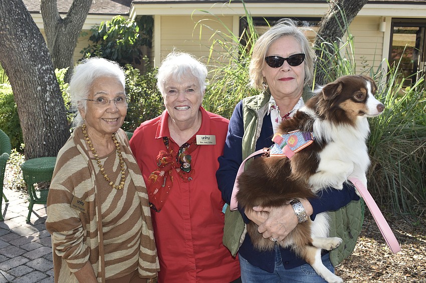 Prayer Chaplain Jacqueline Fitzgerald; Spiritual Care Minister Rev. Amy Zehe; and Mary Lou Davidson, owner of SarasotaDogs.com, and her dog Lyra