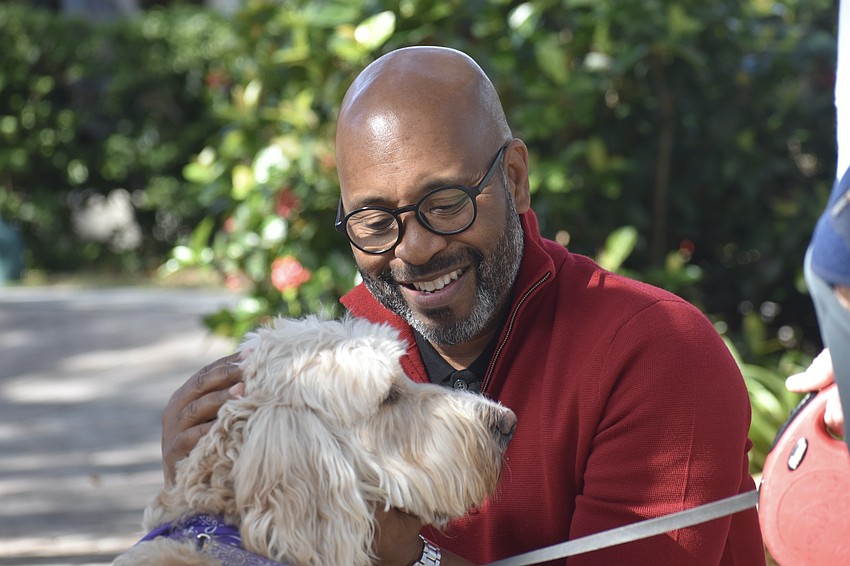 The Modtrak's dog Madison meets Prayer Chaplain Stephen Butler.