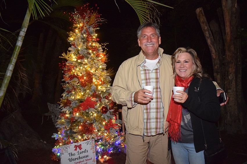 Scott and Cindy Johnson enjoyed the various trees while sipping on hot chocolate made by Chef David Stone.