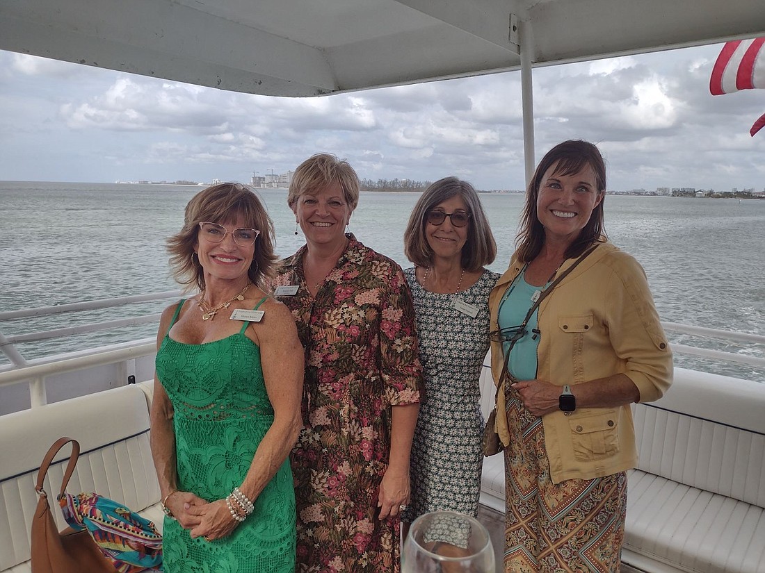 Sharon Meier, Melanie Dale, Susan Loprete and Debra Sauers welcome back Longboat Key Garden Club at its annual welcome back party.