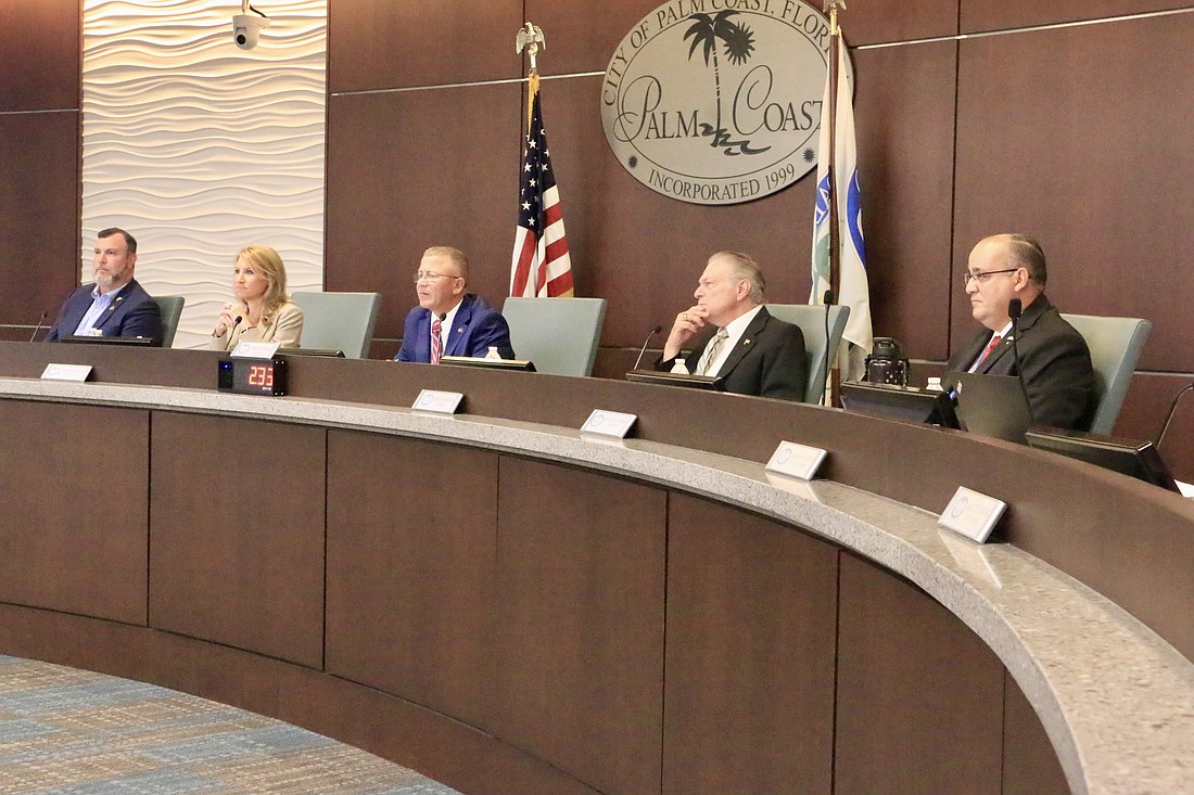 The Palm Coast City Council: Council member Ty Miller, Vice Mayor Theresa Carli Pontieri, Mayor Mike Norris, council member Ray Stevens and council member Charles Gambaro. Photo by Sierra Williams