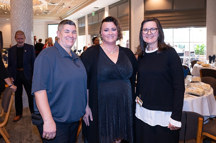 Carla Hendrickson, Robert W. Rosinsky Achievement Award recipient Sherry Hendrickson and Michelle Delibert