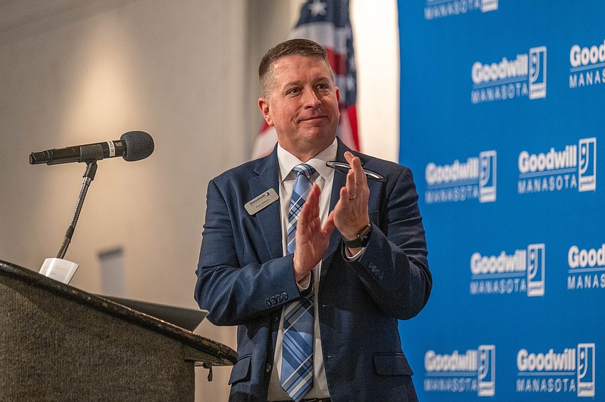 Donn Githens, president and CEO of Goodwill Manasota, welcomes the luncheon guests.