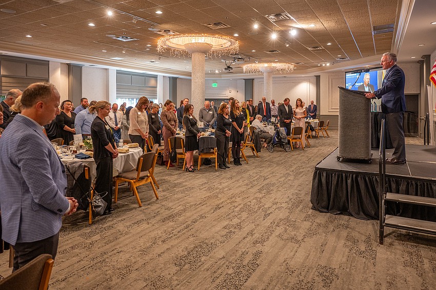 Rev. Timothy Bogess Pastor for First Presbyterian Church of .Sarasota gives the prayer and invocation.