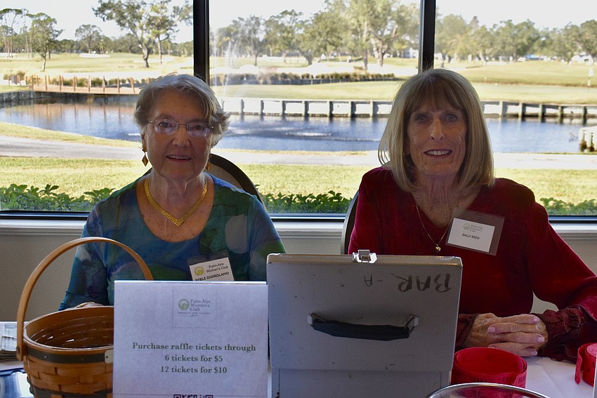 Syble DiGirolamo and Sally Reed sell raffle tickets. Raffle tickets are sold at each luncheon to fundraise for different charities.