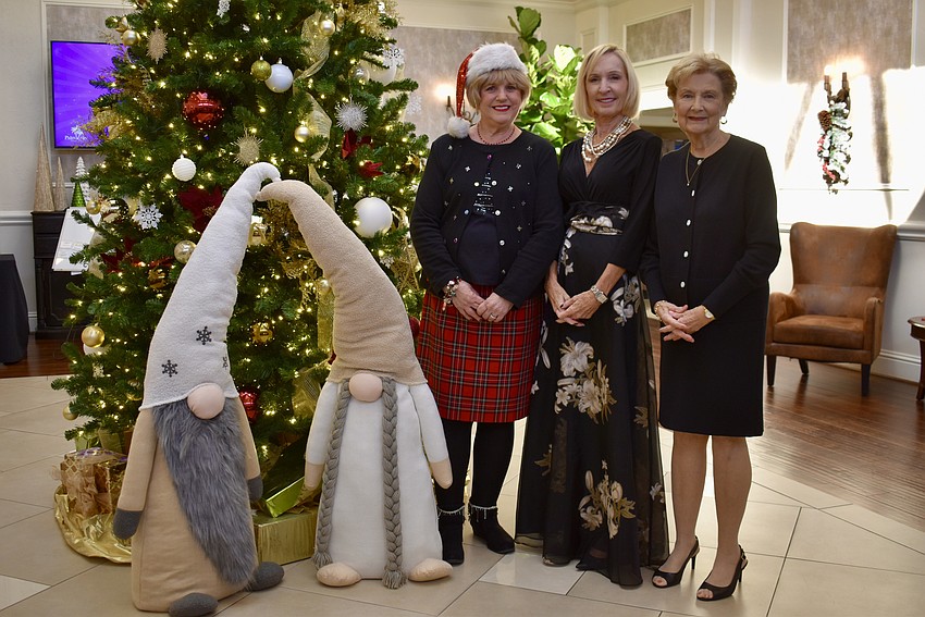 The Palm Aire Women's Club is led by Co-president Debi Frock, Vice President Sandy Keir and Co-president Carol Darling.