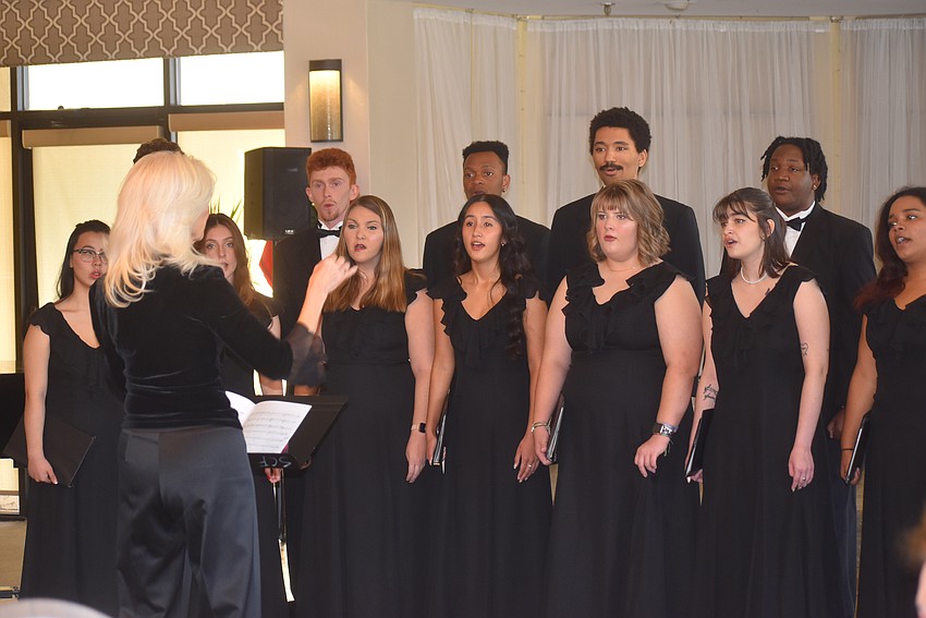 The State College of Florida Chamber Choir sings for the Palm Aire Women's Club on Dec. 5.
