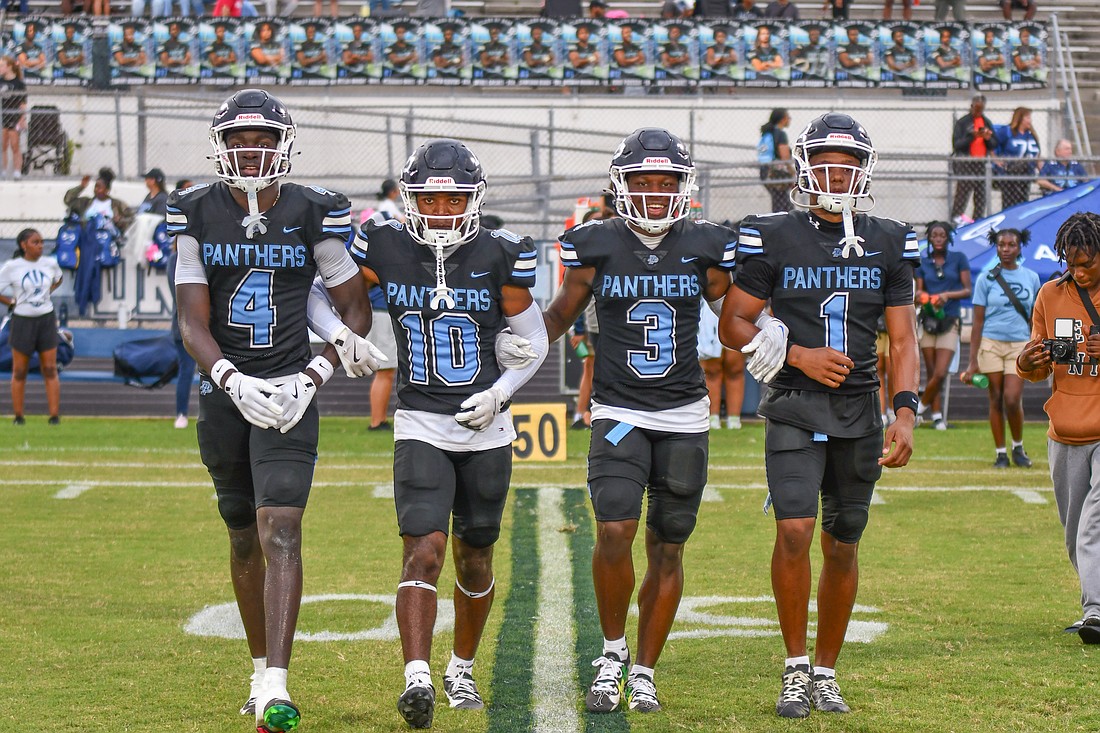 Dr. Phillips football’s senior class — such as Mykel Calitxe, left, Tavion Greaves, Cameran Dixon and Maliki Wright — has been at the heart of the Panthers’ run to the final four.