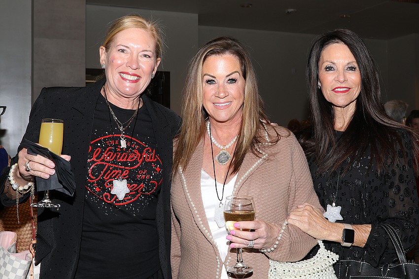 Melissa Gindling, Michelle Brault-Clarke and Linda Vernon celebrate at SPARCC's 